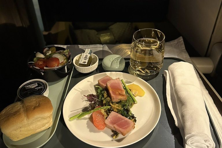 Some seared tuna, salad, and wine