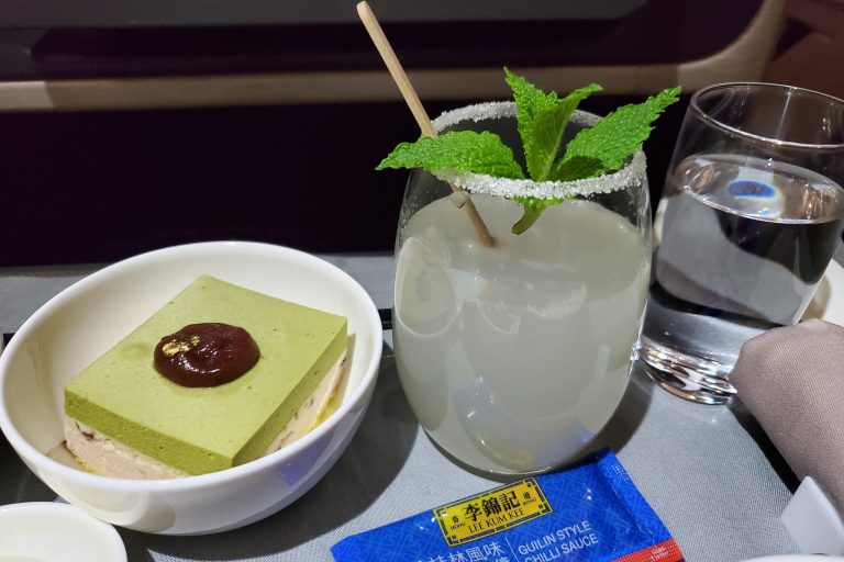 A refreshing drink with mint and a matcha dessert